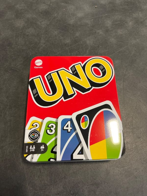 Photo 1 of Mattel Games UNO Card Game for Family Night, Travel Game & Gift for Kids in a Collectible Storage Tin for 2 to 10 Players (Amazon Exclusive)