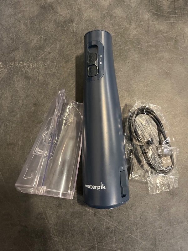 Photo 1 of Waterpik Cordless Pulse Rechargeable Portable Water Flosser for Teeth, Gums, Braces Care and Travel with 2 Flossing Tips, Waterproof, ADA Accepted, WF-20 Blue, Packaging May Vary
