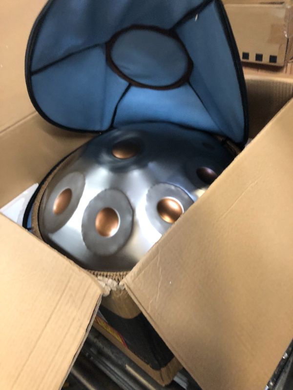 Photo 2 of "SINGOFIRE" Handpan Drum, Handpan Drums for Adults, 22-Inch 10-Notes 440Hz D Minor Kurd Handpan, HandPan Instrument with Soft Handpan Bag, 2 Handpan Mallets, Handpan Stand and Dust-Free Cloth(GoldEye)