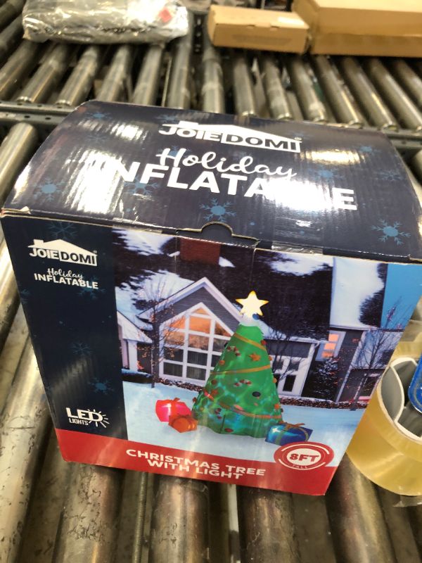 Photo 1 of Joiedomi 8 FT Christmas Inflatable Tree Decoration, Lighted Giant Christmas Tree with Build-in Projection Blow Up Self-Inflatables for Christmas Party Indoor, Outdoor, Yard, Garden, Lawn Décor