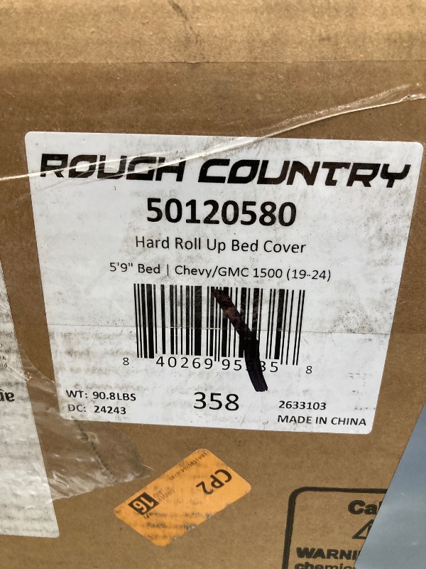 Photo 1 of Rough Country Hard Roll Up Bed Cover for Chevy Silverado/GMC Sierra 1500 (2019-2025) - Fits 5'10 (70") Bed, Low-Profile Tonneau Cover