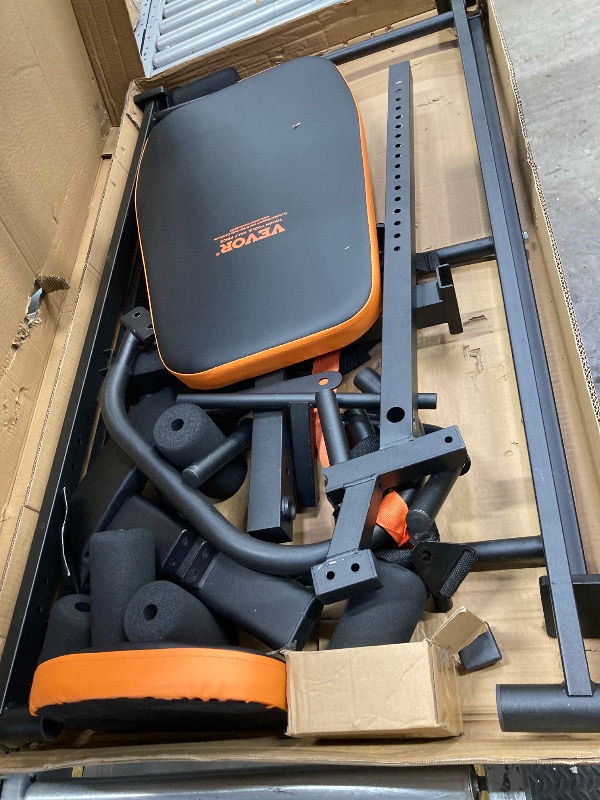 Photo 1 of VEVOR Inversion Table, 300lbs Capacity Heavy Duty Inversion Table, Decompression Back Stretcher Machine, Strength Training Equipment with Headrest, Ankle Lock, Adjustable Protective Belt, Orange/Black