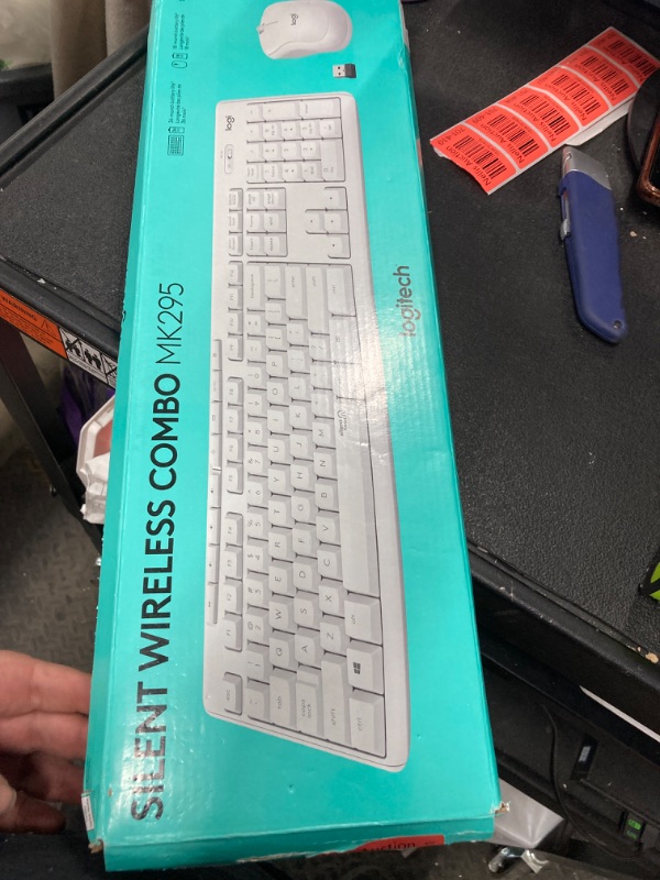 Photo 1 of Logitech MK295 Wireless Mouse & Keyboard Combo with SilentTouch Technology, Full Numpad, Advanced Optical Tracking, Lag-Free Wireless, 90% Less Noise - Off White