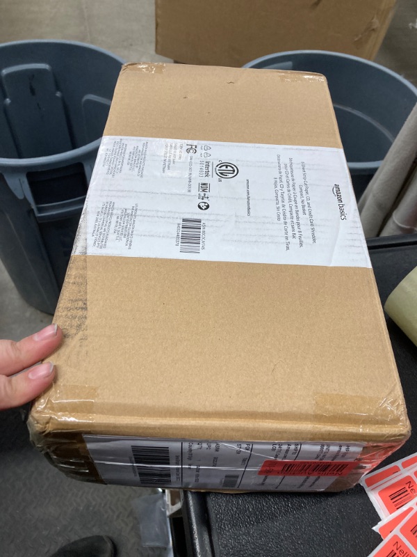 Photo 1 of Amazon Basics 8-Sheet Strip Cut Paper, CD, and Credit Card Shredder, Compact, No Basket, Portable with Extendable Arm, Black