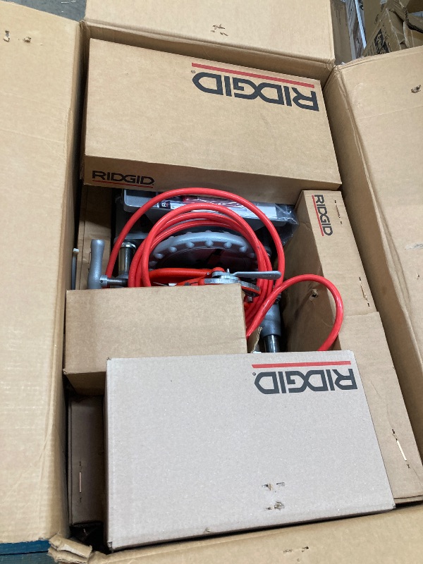 Photo 1 of RIDGID 15682 Model 300 Power Drive Complete, 38 RPM Pipe Threading Machine with 1/2-Inch to 3/4-Inch, 1-Inch to 2-Inch Universal Alloy Threading Die Heads, Oiler