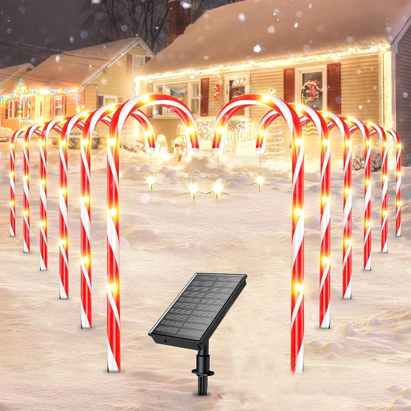 Photo 1 of 12 Pack Christmas Decorations Outdoor Solar Candy Cane Lights, Waterproof Solar Pathway Markers Yard Lights with Star, 8 Modes Xmas Decorations for Garden Yard Decor
