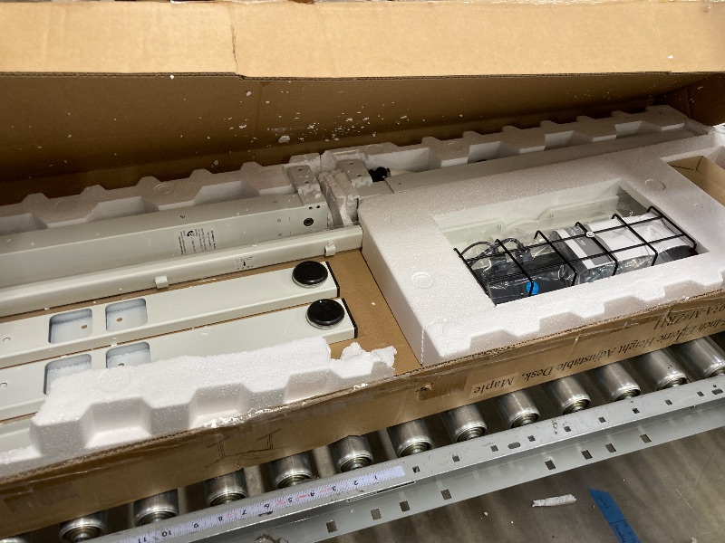 Photo 1 of SHW 55-Inch Large Electric Height Adjustable Standing Desk, 55 x 28 Inches, Maple