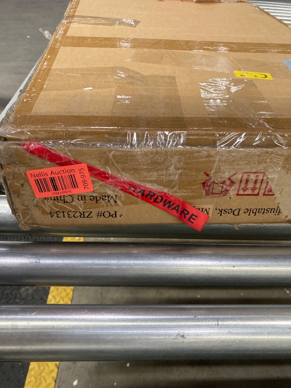 Photo 1 of SHW 55-Inch Large Electric Height Adjustable Standing Desk, 55 x 28 Inches, Maple