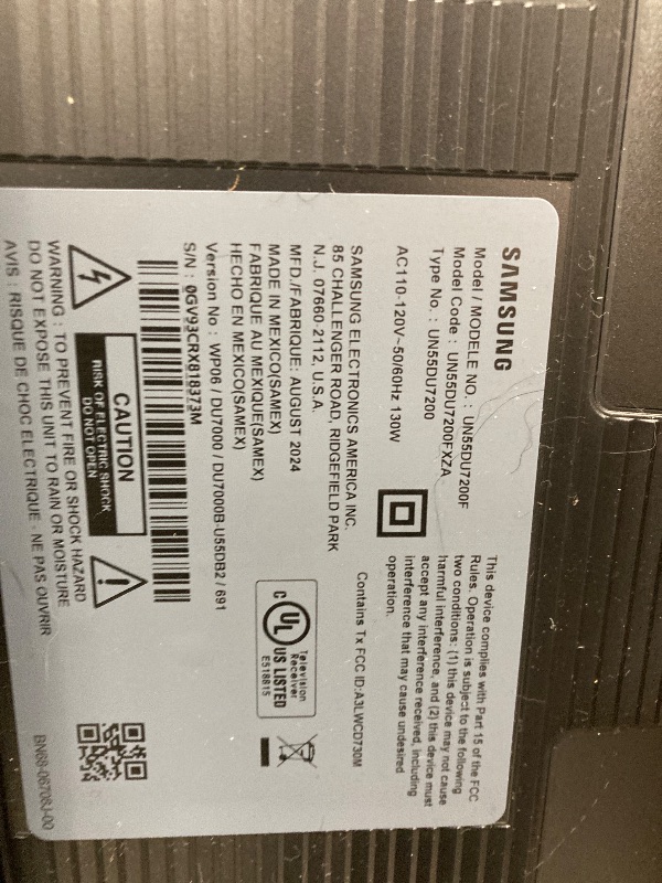 Photo 1 of 55” Class DU7200 Crystal UHD 4K Smart Tizen TV. SCREEN IS BROKEN AND DOES NOT TURN ON. SOLD ONLY IN PARTS.