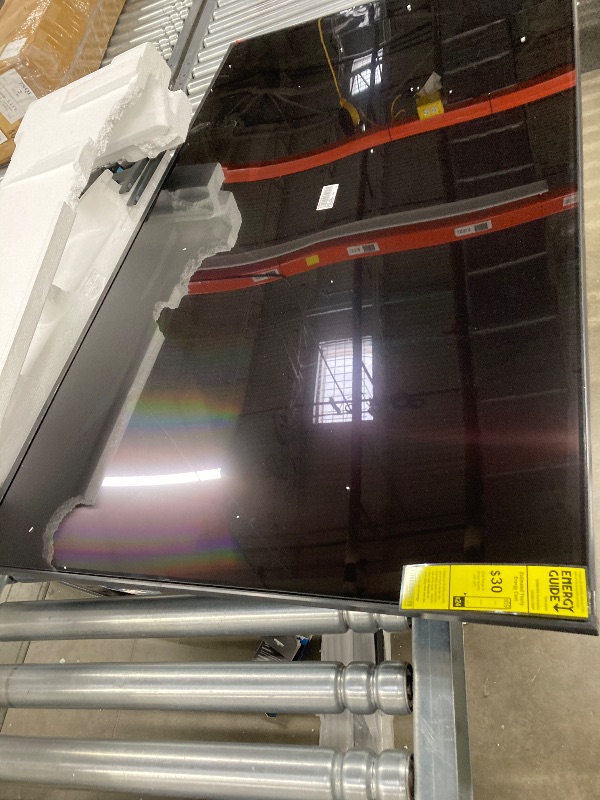 Photo 1 of 55” Class DU7200 Crystal UHD 4K Smart Tizen TV. SCREEN IS BROKEN AND DOES NOT TURN ON. SOLD ONLY IN PARTS.