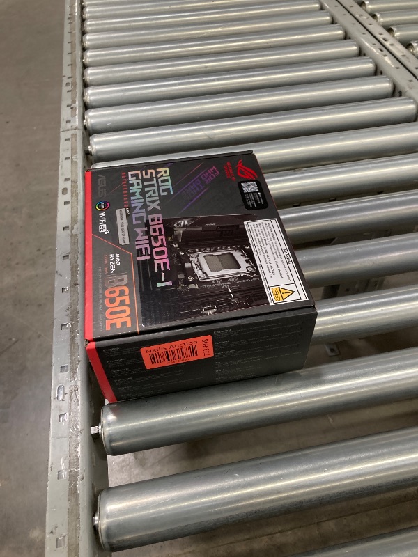 Photo 1 of ASUS ROG Strix B650E-I Gaming WiFi AMD Ryzen AM5 mini-ITX motherboard, 10 + 2 power stages, DDR5, two M.2 slots, PCIe 5.0, 2.5G LAN, WiFi 6E, USB 3.2 Gen 2x2 Type-C port, and Aura Sync RGB lighting