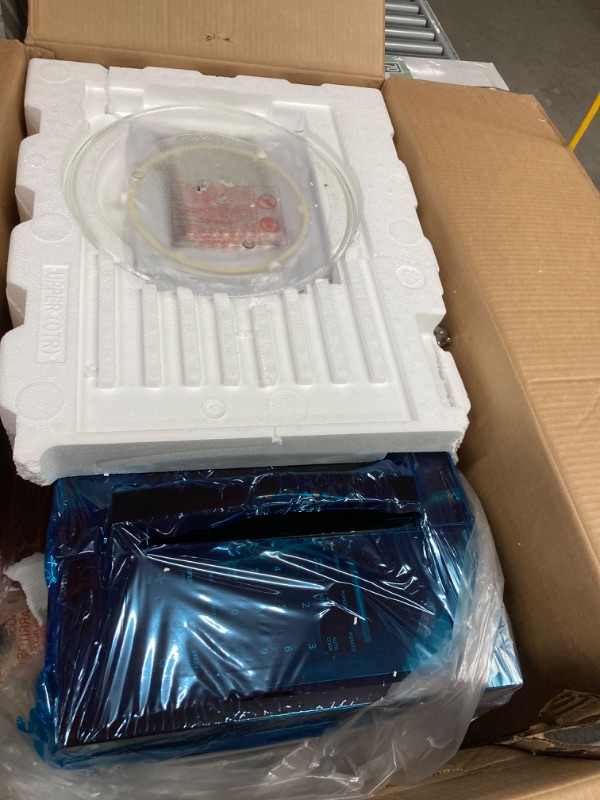 Photo 1 of 1.7 cu. ft. 1000-Watt Over the Range Microwave in Black