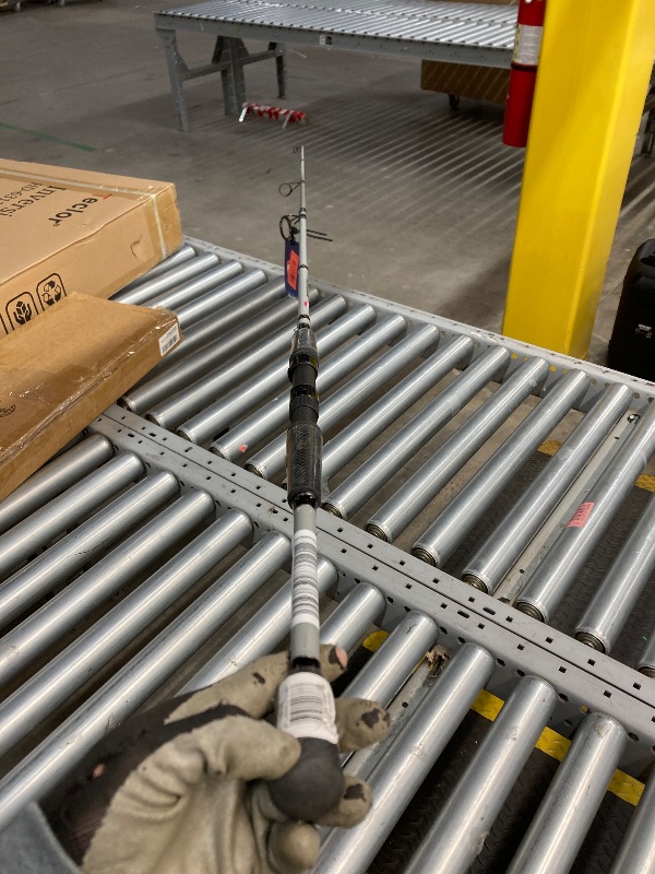 Photo 1 of PENN 7' Battle IV LE Spinning Reel and Fishing Rod Combo Kit, 5000 Reel, CNC Gear Technology, Full Metal Body and Sideplate, HT-100 Drag System