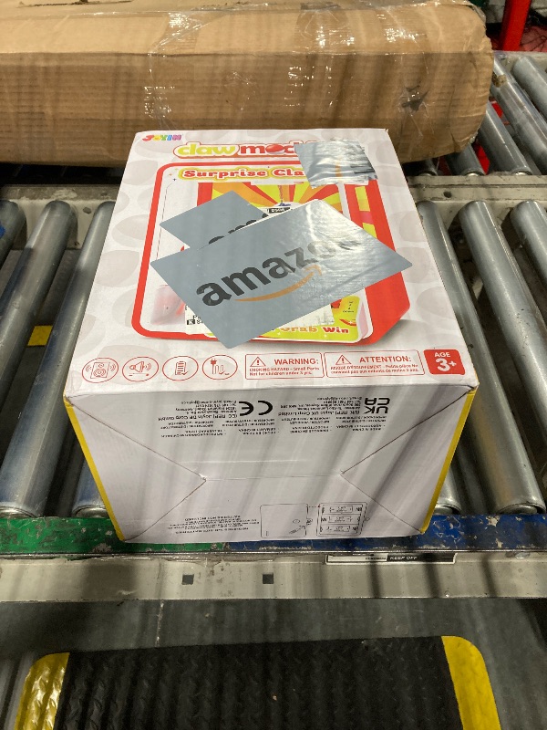 Photo 1 of JOYIN Claw Machine Arcade Toy with LED Light & Adjustable Sound, Rechargable Dispenser Toys Mini Vending Machine for Kids - Perfect Christmas & Birthday Big Gifts for Kids, Ages 3+