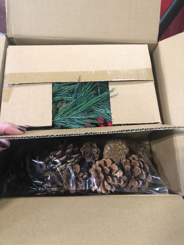 Photo 1 of ***USED***SAYAYA 80 PCS Christmas Artificial Pine Needles Branches and Red Berry Stems with Pine Cones Christmas Flowers Artificial for DIY Christmas Garland Wreath Christmas Tree and Christmas Home Decor