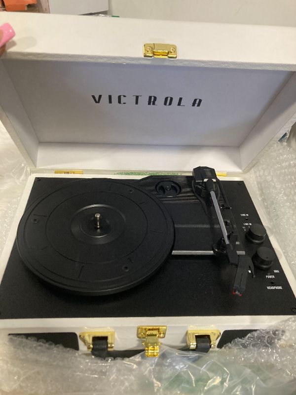 Photo 7 of ***NON FUNCTIONAL*** ***no disc for function test, but power can be turned on*** Victrola Vintage 3-Speed Bluetooth Portable Suitcase Record Player with Built-in Speakers | Upgraded Turntable Audio Sound|White, Model Number: VSC-550BT-WH