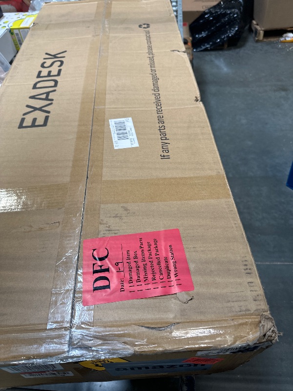 Photo 1 of ExaDesk 48 * 30 Inches Electric Standing Widened Desk Adjustable Height with 4 Drawers, Double Storage Shelves Stand Up Desk, Home Office Workstation Sit Stand up Desk (Light Rustic Brown)