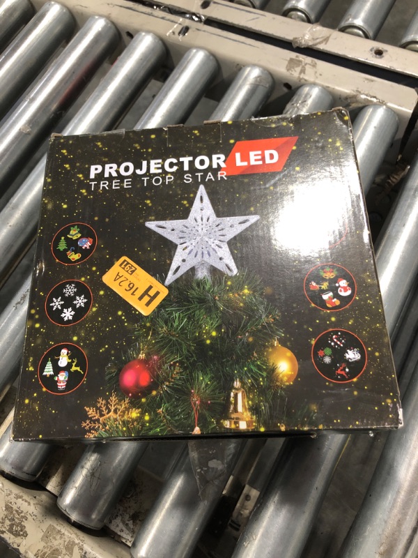 Photo 1 of Winpull Christmas Tree Topper Lighted with 6 Pattern Projection Modes, Christmas Star Tree Topper Built-in LED Rotating Lights, 3D Glitter Projector for Christmas Decorations (Silver)