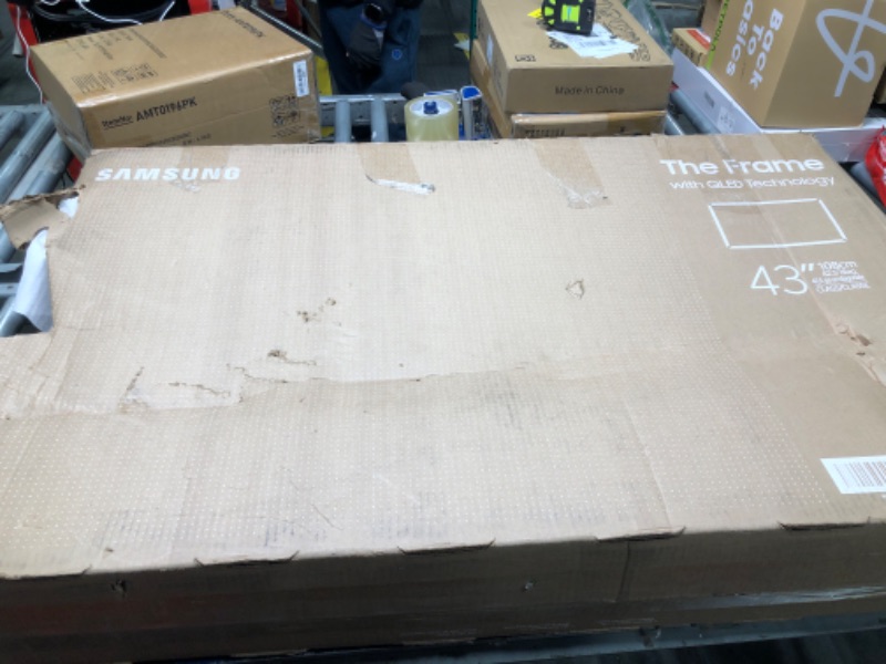 Photo 1 of SAMSUNG 43-Inch Class QLED 4K LS03D The Frame Series Quantum HDR Smart TV w/ Dolby Atmos