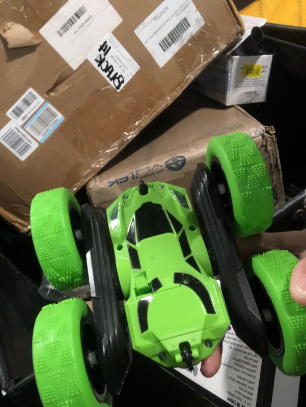 Photo 1 of ***USED***Remote Control Car Stunt RC Cars, 90 Min Playtime, 2.4Ghz Double Sided 360° Rotating RC Crawler with Headlights, 4WD Off Road Drift RC Race Car Toy for Boys and Girls Aged 6-12 Green