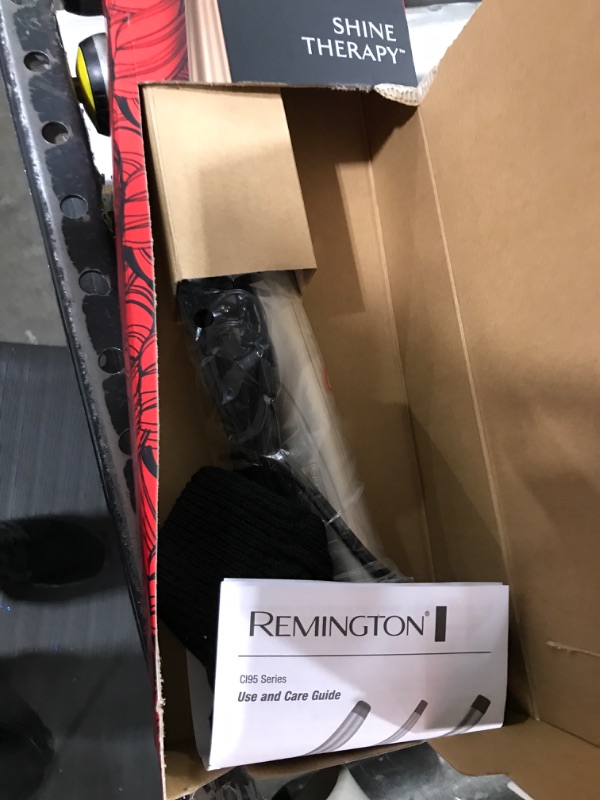 Photo 2 of Remington Shine Therapy Argan Oil & Keratin Infused ½-1 Inch Tapered Curling Wand for Natural Curls, Includes Heat Glove Champagne 1/2" - 1"