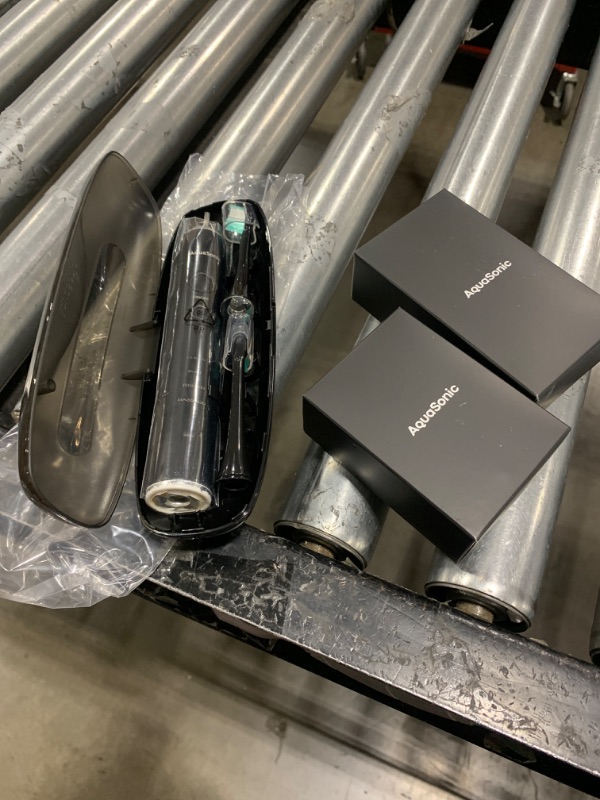 Photo 1 of Aquasonic Black Series Ultra Whitening Toothbrush – ADA Accepted Electric Toothbrush- 8 Brush Heads & Travel Case – 40,000 VPM Electric Motor & Wireless Charging - 4 Modes w Smart Timer
