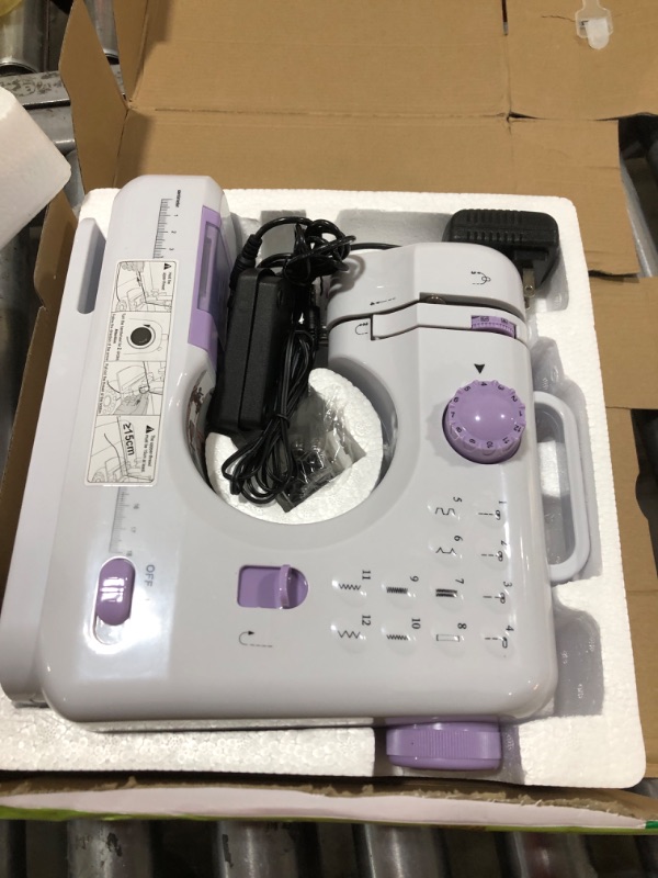 Photo 1 of JUCVNB Mini Sewing Machine for Beginners and Kids Ages 8-12, Portable Sewing Machines with 12 Built-in Stitch Patterns, Light, 2 Speed Foot Pedal - Purple & White (with Basic Accessory Kit)