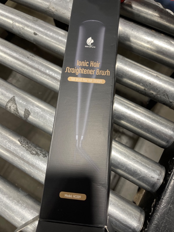 Photo 1 of ionic hair straightener brush