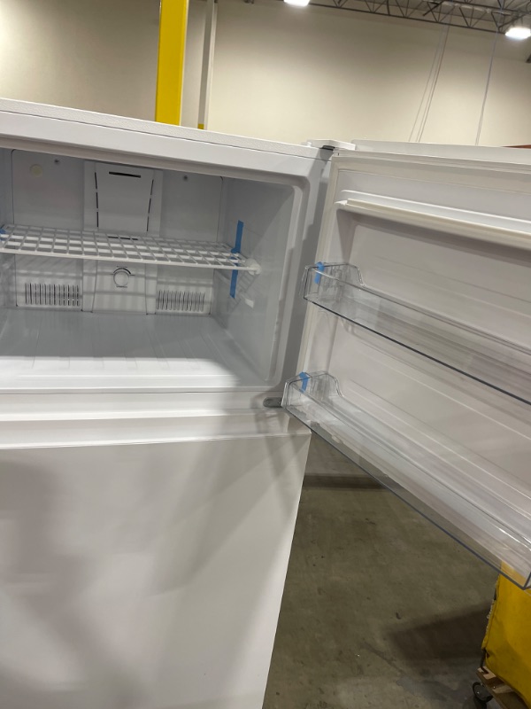 Photo 1 of Kenmore 33 in. 20.5 cu. ft. Capacity Refrigerator/Freezer with Full-Width Adjustable Glass Shelving, Humidity Control Crispers, ENERGY STAR Certified, White