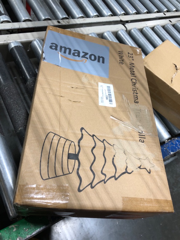 Photo 1 of BAYN Metal Christmas Tree Collar, 23-Inch Diameter Base Cover Decorative Christmas Tree Ring Festive Xmas Artificial Tree Stand Cover for Christmas Décor