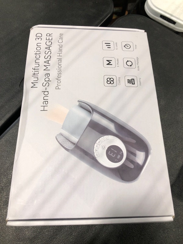 Photo 1 of Hand Massager with Heat and Compression, 3D Machine for Arthritis and Carpal Tunnel Syndrome Relief, 6 Levels Pressure Point Massage, Wrist and Palm Kneading with Blowing Mode, Gifts for Women, Black