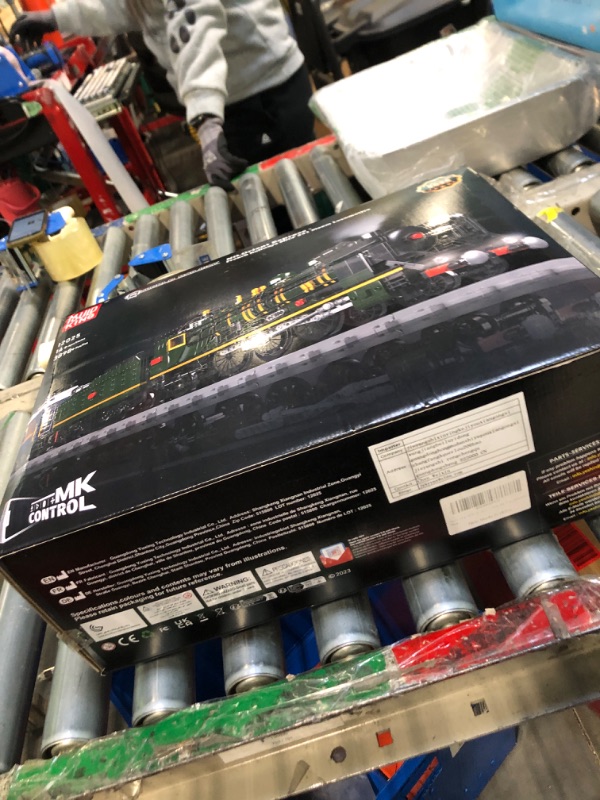 Photo 1 of Mould King Orient Express Steam Locomotive Train Building Kit with LED Lighting, Remote/App Control Passenger Toy Block Set, Train Model with Motors and Tracks for Adults Kids(3898 PCS)