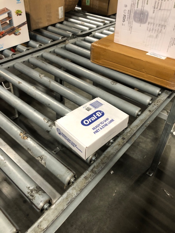 Photo 1 of Oral-B iO Series Ultimate Clean Electric Toothbrush Replacement Brush Heads for an Oral-B Electric Toothbrush, 4 count, Black