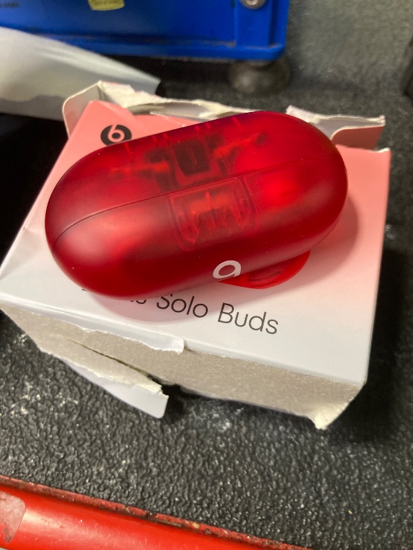 Photo 2 of Beats Solo Buds - Wireless Bluetooth Earbuds | 18 Hours of Battery Life | Apple & Android Compatibility | Built-in Microphone - Transparent Red