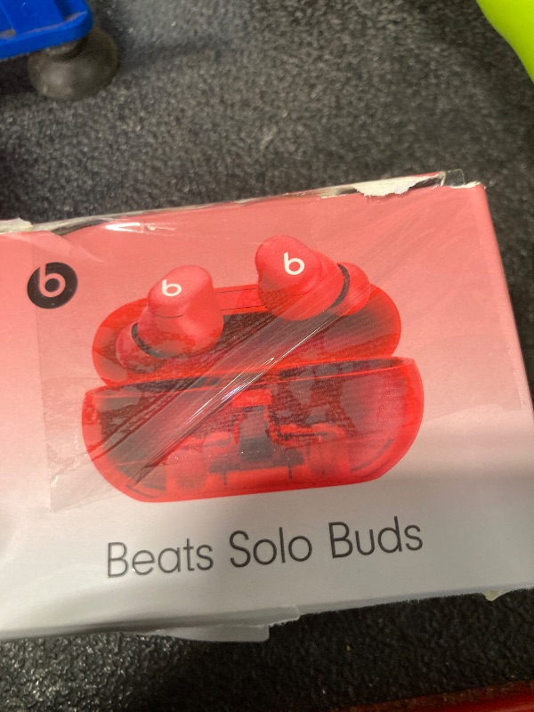 Photo 4 of Beats Solo Buds - Wireless Bluetooth Earbuds | 18 Hours of Battery Life | Apple & Android Compatibility | Built-in Microphone - Transparent Red