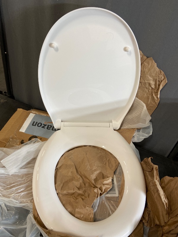 Photo 2 of R&T Elongated Toilet Seat Slow Close Heavy Duty Standard Toilet Seat, Easy to Install, Easy to Remove, Plastic White