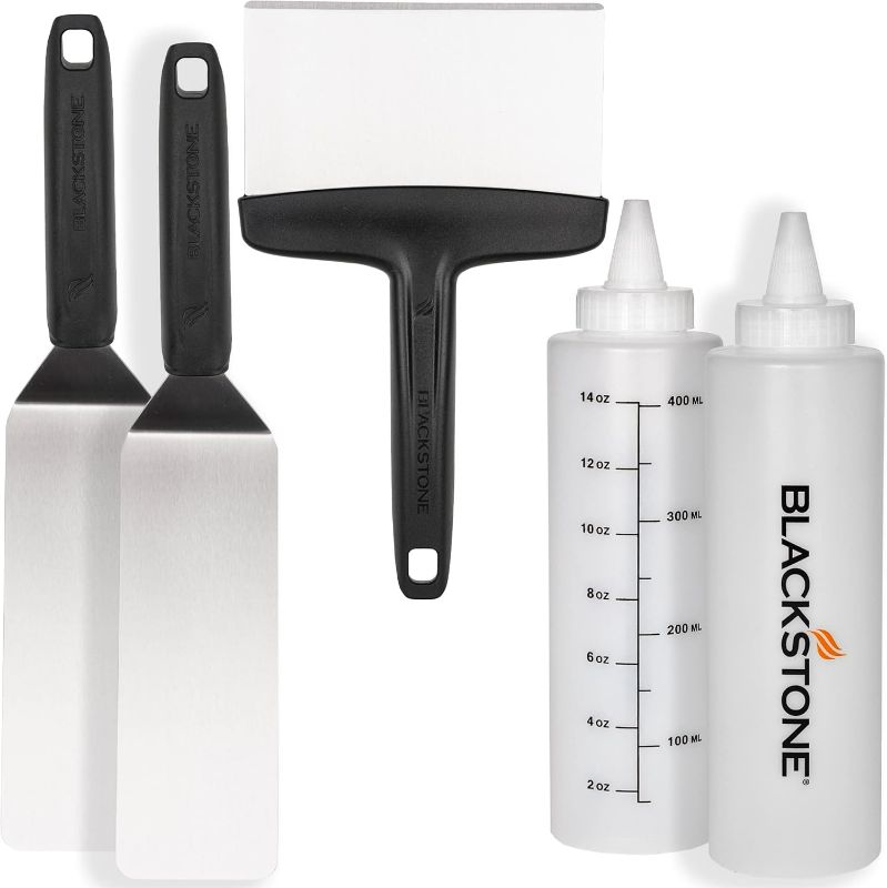 Photo 1 of Blackstone Professional Grade Accessory Tool Kit (5 Pieces) 16 oz Bottle, Two Spatulas, Chopper/Scraper and One Cookbook-Perfect for Cooking Indoor or Outdoor, Multicolor
