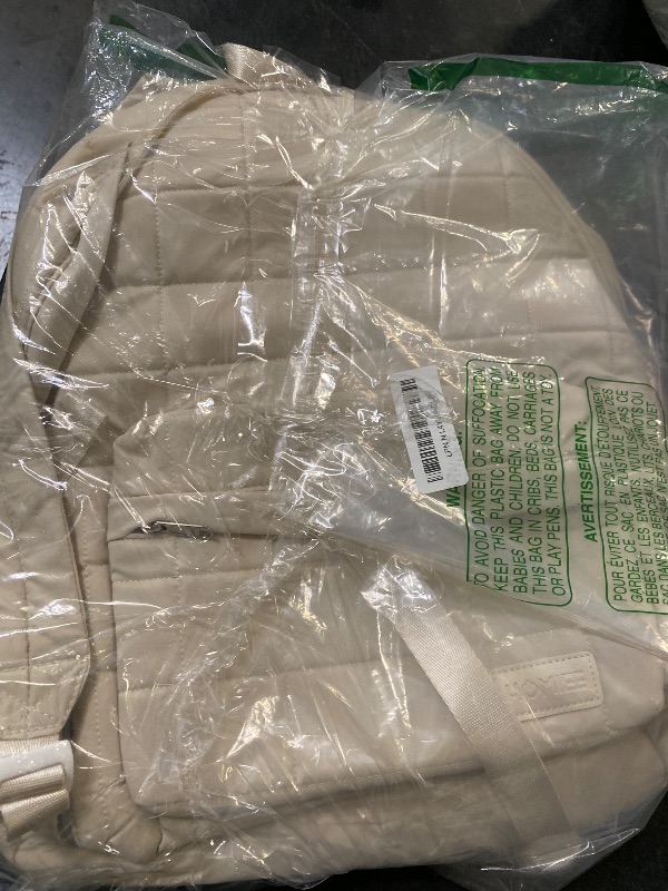 Photo 1 of cream backpack homiee brand 