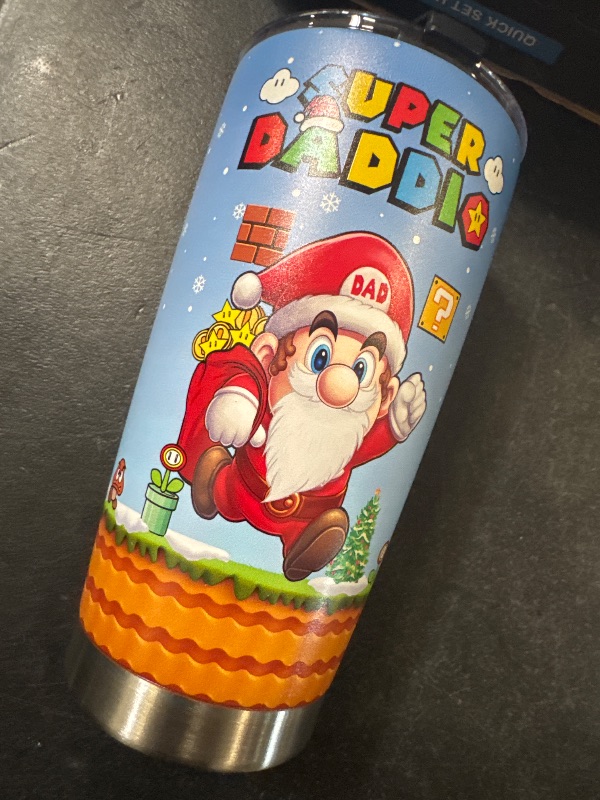 Photo 1 of Dad Gifts for Christmas, Birthday - Super Daddio Tumbler with Lid - 20oz Stainless Steel Coffee Dad Mug - Super Santa Xmas Tumbler Gifts for Dad, Men

