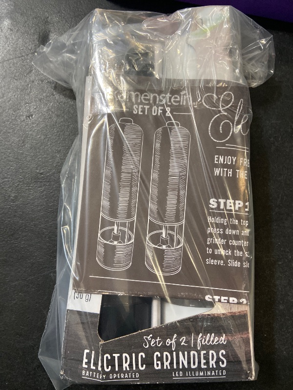 Photo 1 of (2 pack) Kamenstein 8-Inch Battery Operated Grinder Set Black & White, Filled Salt & Pepper Mill Set
