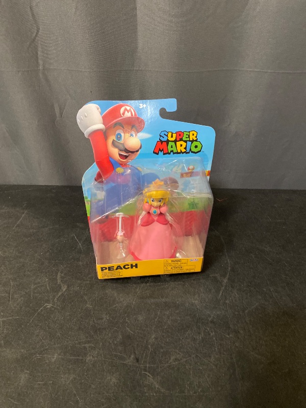 Photo 1 of Nintendo 4 Inch Action Figure Princess Peach with Umbrella