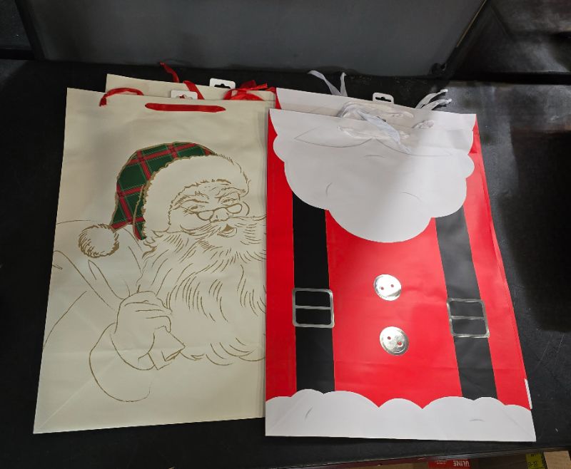 Photo 1 of 4 Pack Santa Jumbo Christmas Gift Bags - 2 Of Each Style 