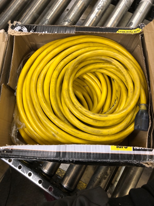 Photo 2 of Southwire Extra Heavy Duty Extension Cord, 100Ft, 10 Gauge, 3 Conductor, Outdoor Cord, Lighted End, SJTW, Yellow, 2689SW0002