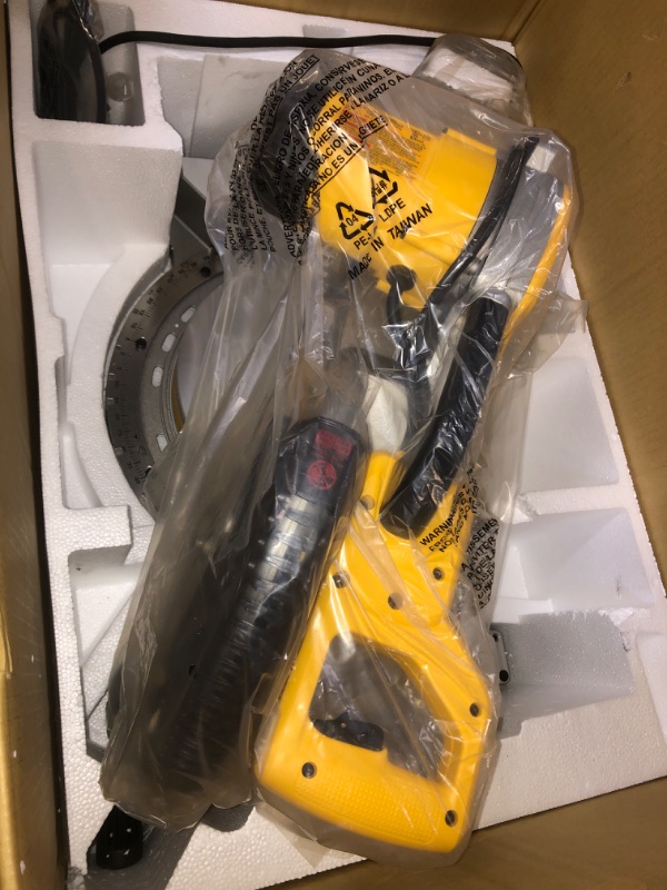 Photo 2 of DeWalt 15 amps 12 in. Corded Dual-Bevel Sliding Compound Miter Saw