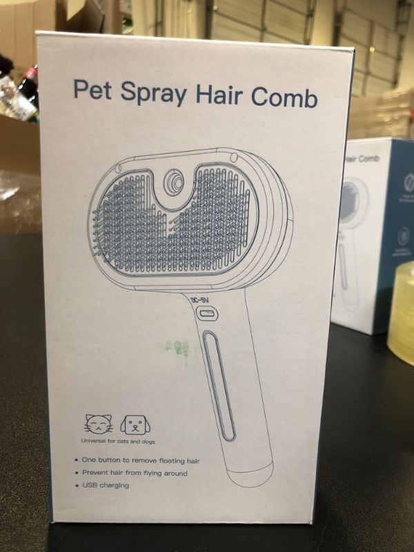 Photo 2 of Cat/Dog Grooming Tool - Hair Removal Brush with Water Tank, Release Button and Steam Feature for Deshedding