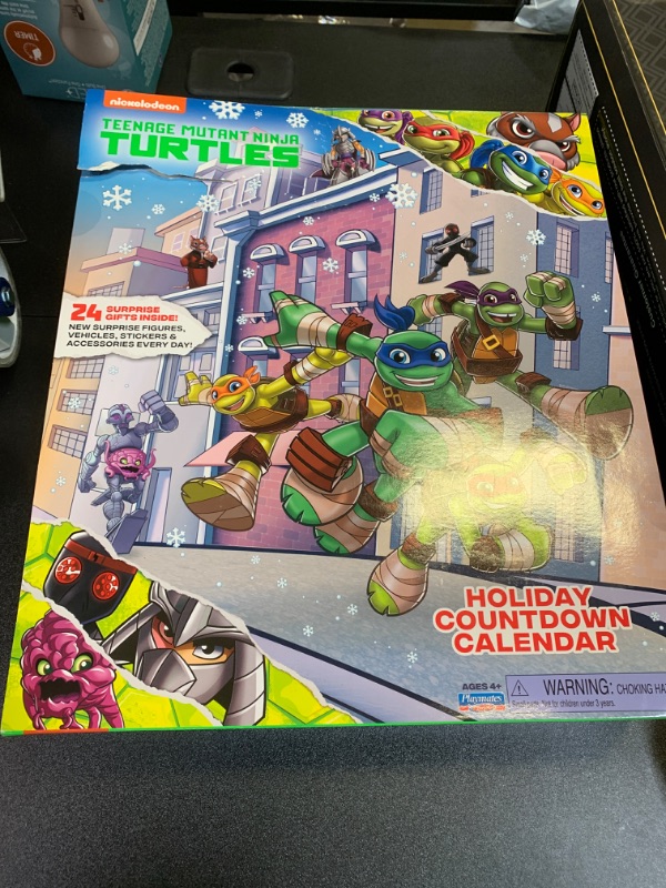 Photo 2 of Teenage Mutant Ninja Turtles: Holiday Countdown Calendar by Playmates Toys box is damaged