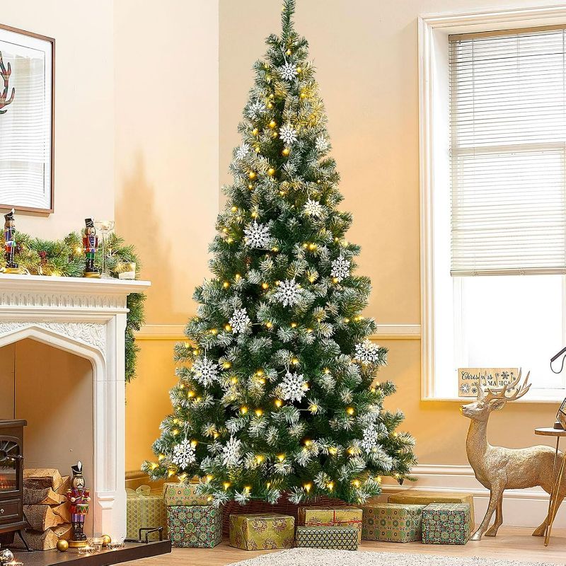 Photo 1 of Hatisan Artificial Christmas Trees with 1000 Branch Tips, 300pcs Led Lights, Snowflakes Decorations and Tree Stand, Christmas Decorations for Holiday Party Decor Indoor Outdoor(Snowflakes,7.5ft)