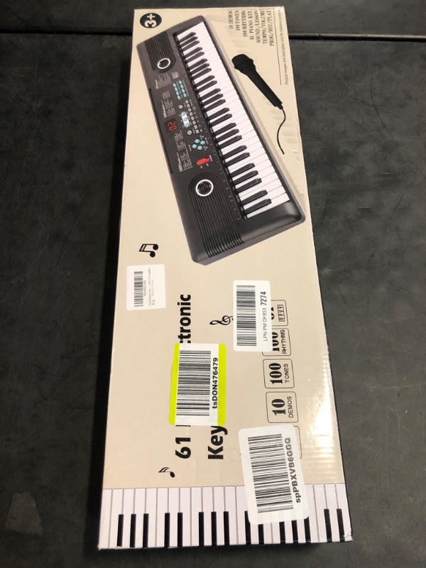 Photo 1 of 61 keys piano keyboard, Electronic Digital Piano with Built-In Speaker Microphone, Sheet Stand and Power Supply, Portable Keyboard Gift Teaching for Beginner