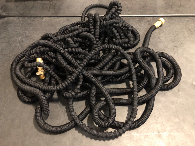 Photo 1 of Flexi Hose Upgraded Expandable Garden Hose 50 ft Extra Strength 3/4 Solid Brass Fittings - The Ultimate No-Kink Flex 50 ft Water Hose (Black, 50FT)