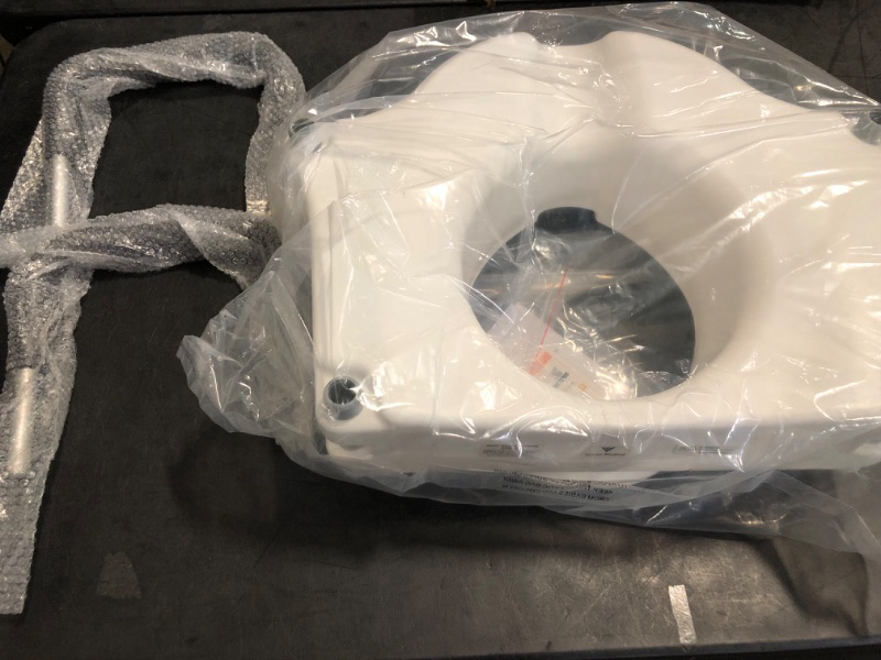 Photo 1 of FSA/HSA Eligible, Vaunn Raised Toilet Seat and Elevated Commode Booster Seat Riser with Removable Padded Grab Bar Handles & Locking Mechanism